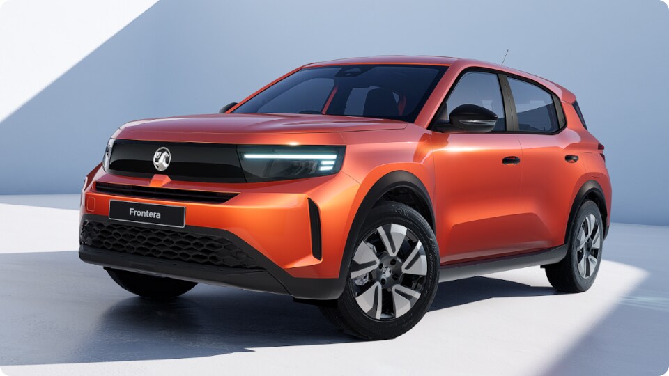 Front and Left side view of an orange Vauxhall Frontera Design